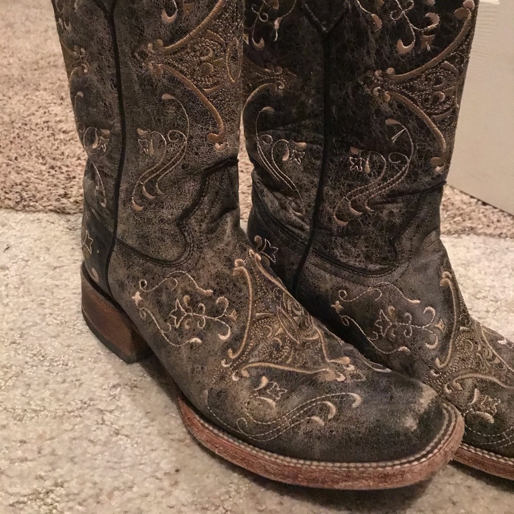 Distressed black boots